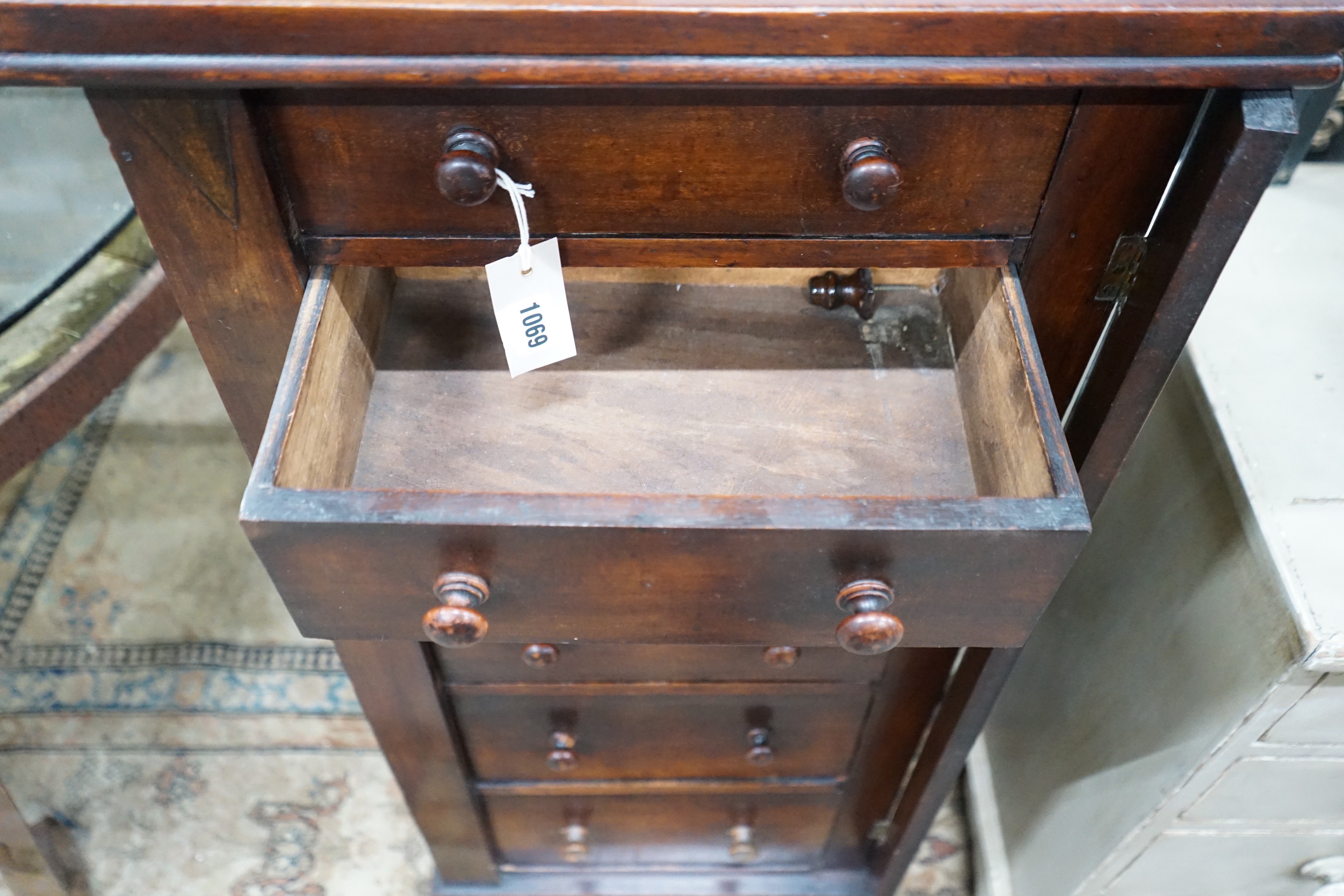 A Victorian mahogany Wellington chest, width 49cm, depth 35cm, height 109cm